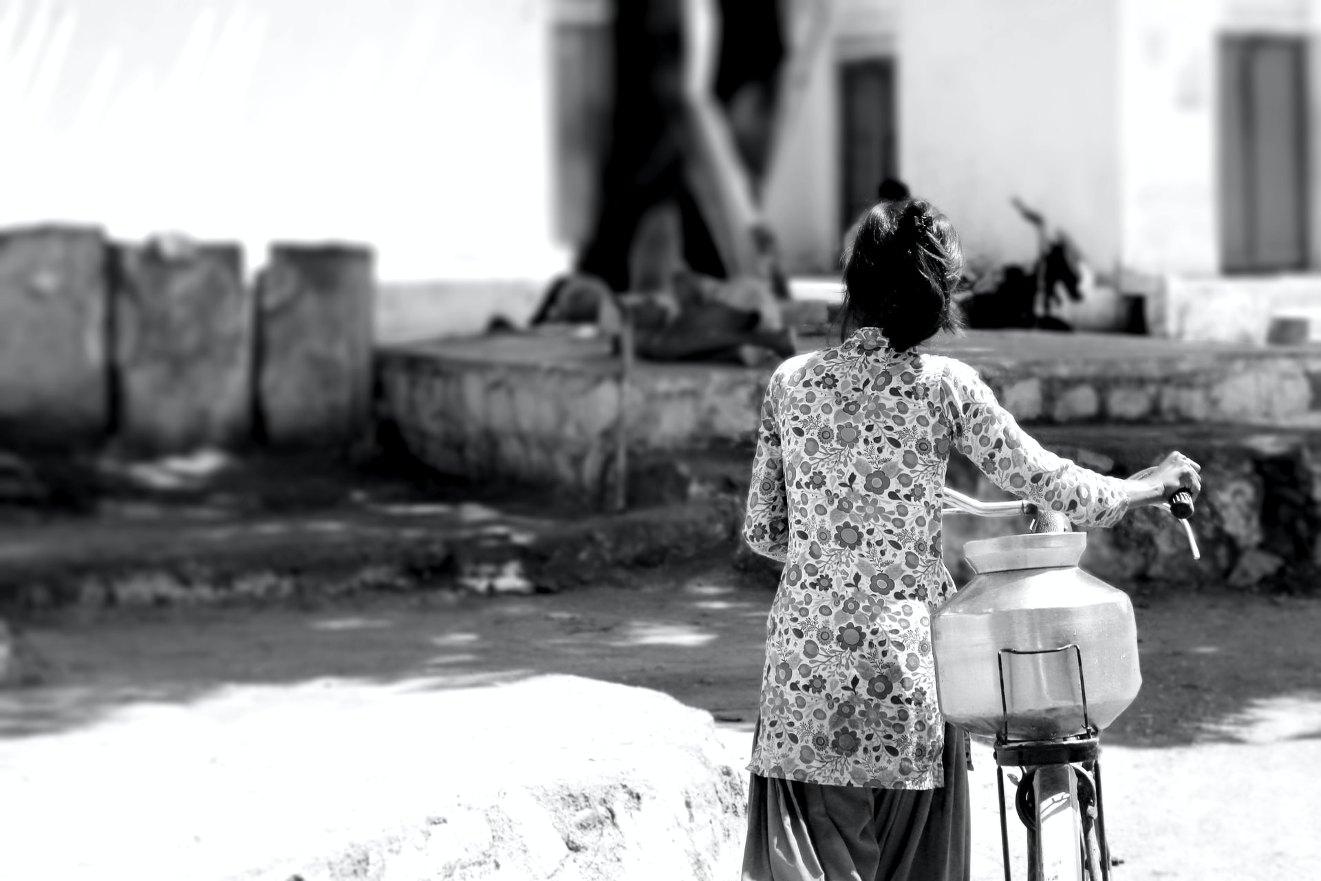 woman carrying water