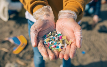 Hands holding plastic pieces