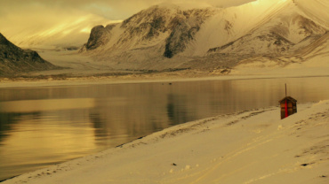 Sepia toned picture of glacier and water